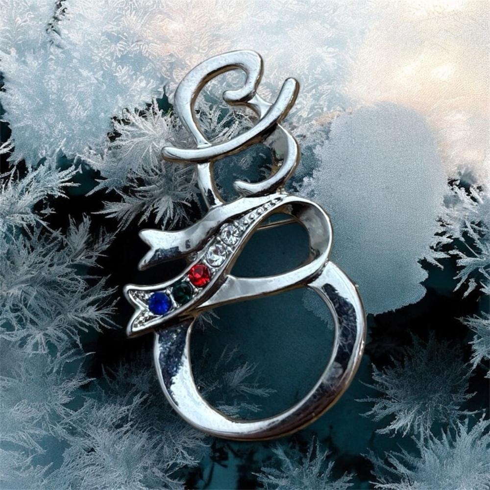 Elegant Silver Snowman Brooch